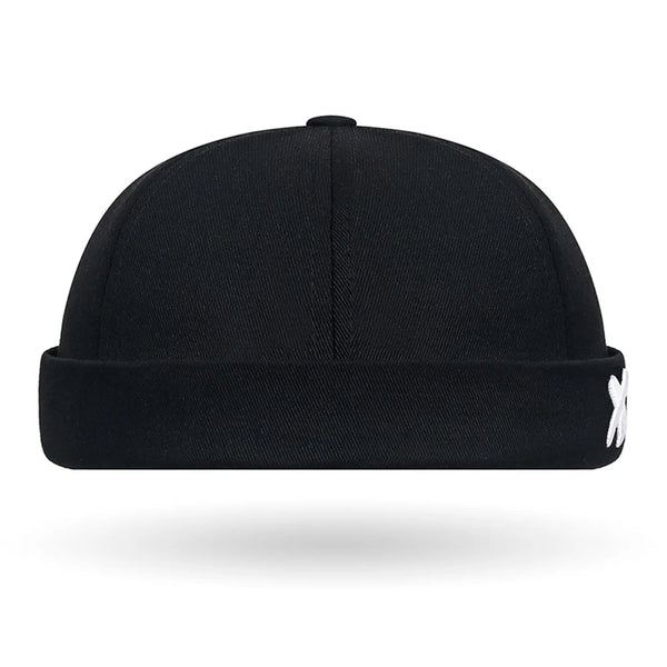 Urban Edge cap front view showing embroidered detail and brimless construction