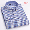 Oxford Confidence Shirt in classic plaid, blending style and professionalism.