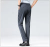 Close-up of stretch technology in dress pants fabric showing elasticity and recovery