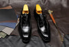 Men's luxury dress shoes featuring a sophisticated shine.