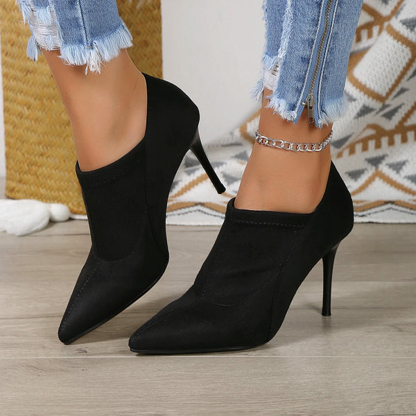 Chic taupe pointed toe pumps with a comfortable fit, perfect for any wardrobe.