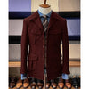 Vintage tweed herringbone men's blazer with four pockets, notched collar, and single-breasted design for stylish occasions.