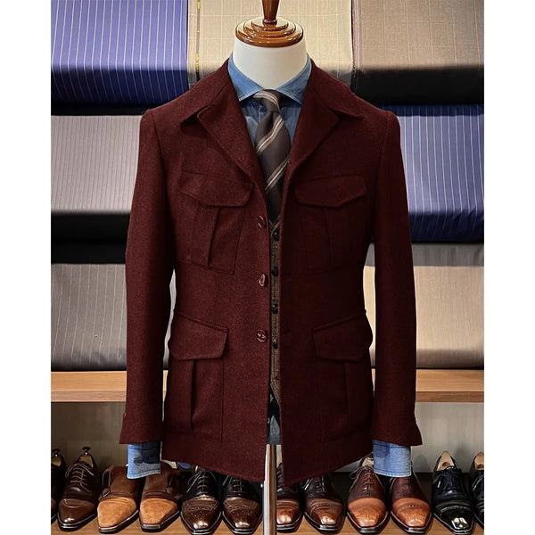 Vintage tweed herringbone men's blazer with four pockets, notched collar, and single-breasted design for stylish occasions.