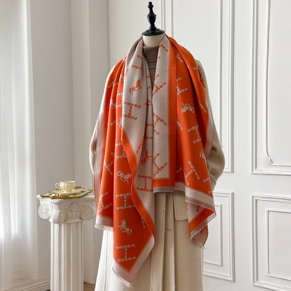 Cashmere shawl with artful florals, adding elegance to any winter outfit.