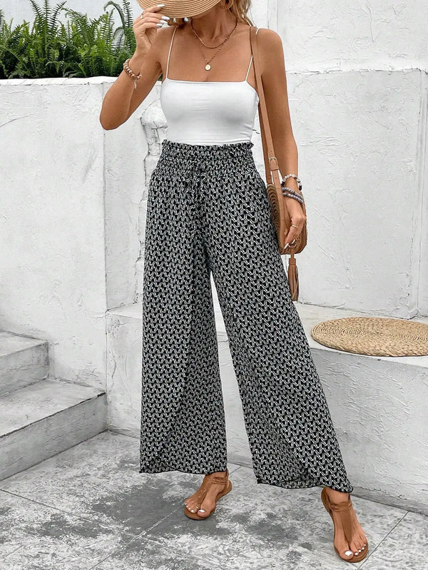 Floral wide-leg chiffon pants for women, ankle-length, elastic waist, perfect for summer casual or office wear.