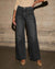 Chic high-waisted wide-leg jeans for women with pockets, distressed details, and a comfortable fit for casual or office wear.