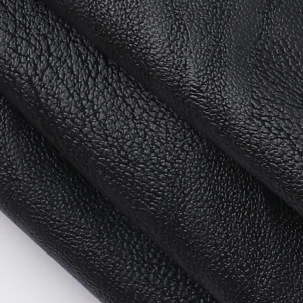 Chic cropped faux leather biker jacket for women with rivet detailing and slim fit, perfect for edgy streetwear style.
