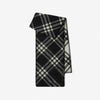 Elegant checkered scarf styled as a neck warmer, ideal for cold weather.