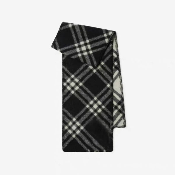 Elegant checkered scarf styled as a neck warmer, ideal for cold weather.