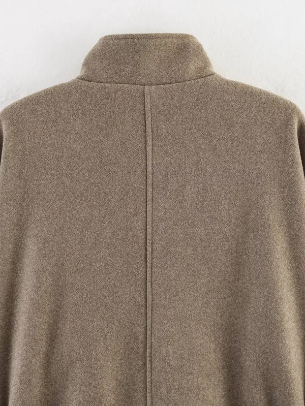 Women's autumn outerwear featuring adjustable belt and elegant turtleneck collar