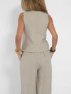 Close-up of the fabric drape on the Radiant Summer Suit, emphasizing breathability.