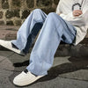 Contemporary men's jeans with loose straight cut and comfortable elastic waistband