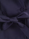 Spring trench coat with tie waist and timeless button closure