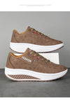 Stride Higher sneakers showing chunky platform wedge from rear