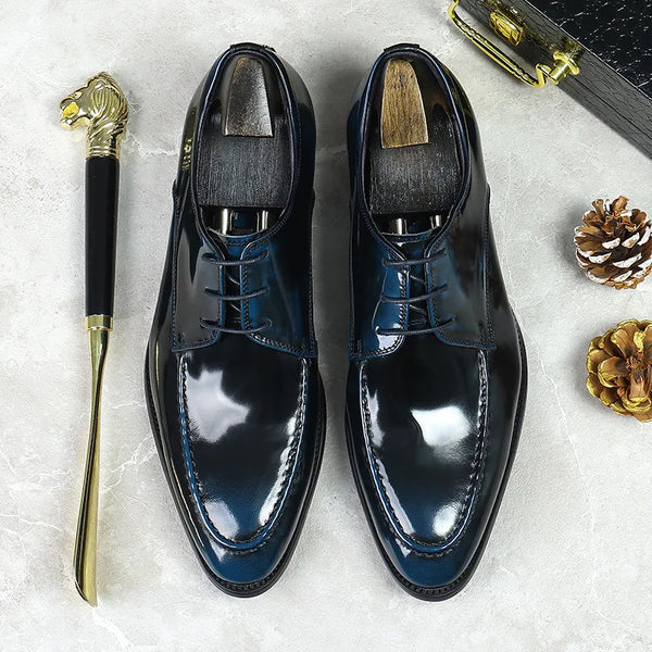 Close-up of handcrafted leather Oxfords showcasing premium cowhide material.