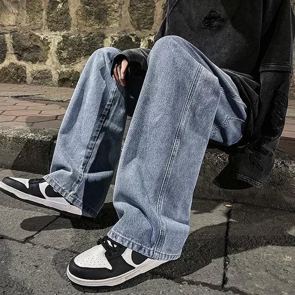 Relaxed fit men's jeans with contemporary wide-leg cut and elastic waistband