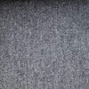 Detail shot of the two-button closure on the blue-grey flannel suit jacket.