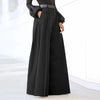 Chic wide leg palazzo pants for women in nylon-cotton blend, featuring pockets and button detail for stylish comfort.