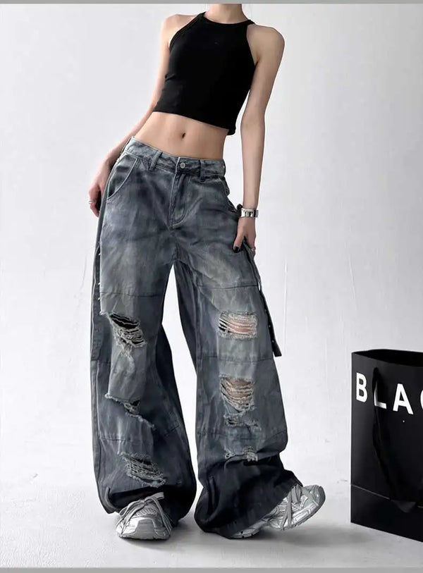 Trendy high-waist wide-leg ripped jeans for women with tie-dye and distressed detailing, perfect for casual street style.
