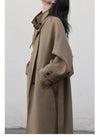 Timeless long trench in wool blend with defining waist belt and collar