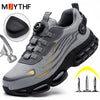 Steel Guard work boots with rotating button closure and steel toe protection on white background