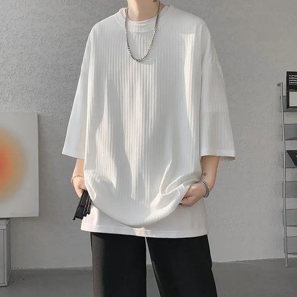 Lifestyle shot of striped summer tee worn while enjoying outdoor activities.