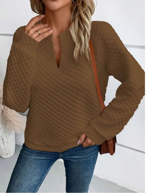 Comfortable deep V-neck hoodie for lounging and errands