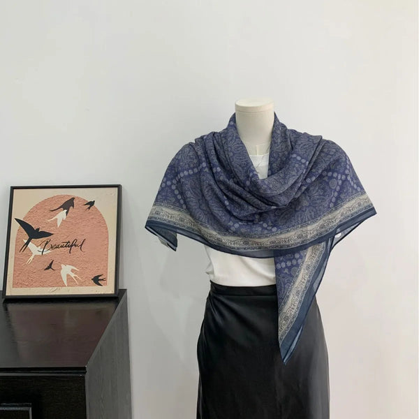 Elegant women's scarf with a delicate vintage charm, perfect for casual ensembles.