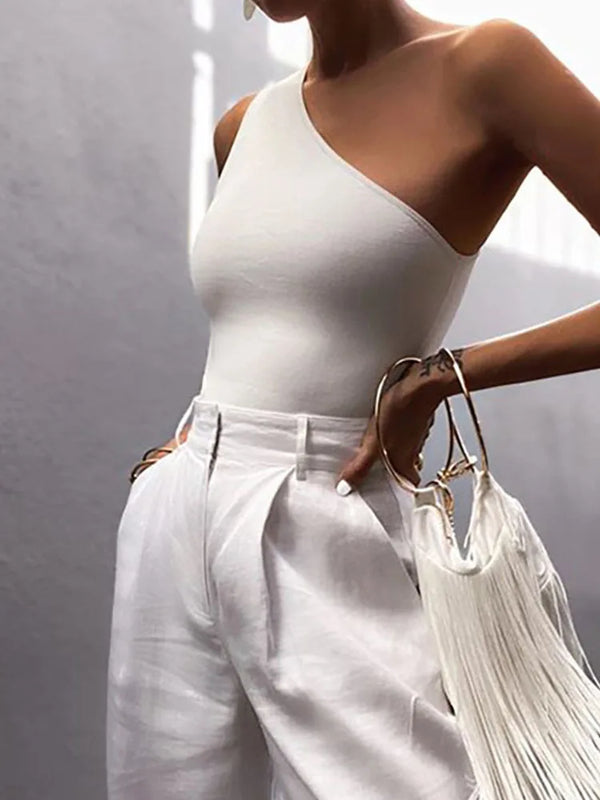High-stretch cotton polyester crop tank featuring modern asymmetric design