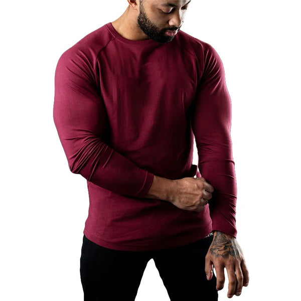 Men's long sleeve cotton tee in black, featuring moisture-wicking technology for comfort and breathability in casual wear.