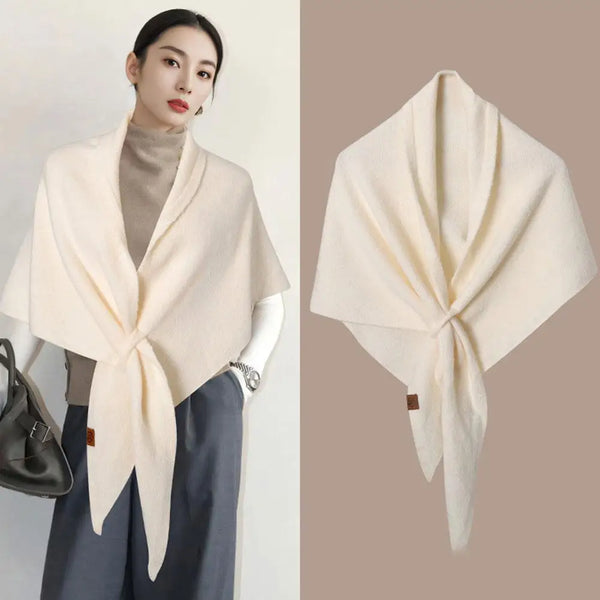 Elegant knitted triangle scarf shawl in soft wool blend for women.