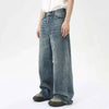 Vintage-inspired washed blue denim jeans with wide leg cut for men