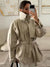 Modern khaki trench coat with protective stand collar and tailored fit