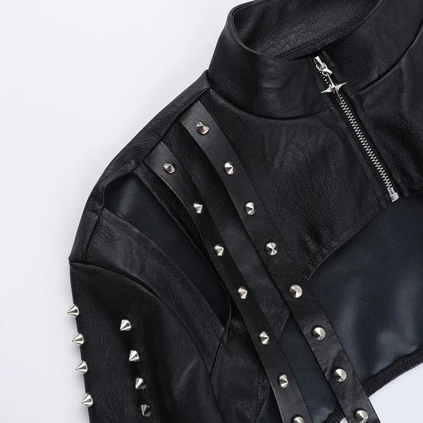 Chic cropped faux leather biker jacket for women with rivet detailing, slim fit, and zip closure for edgy style.