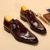 Dapper carved Oxford shoes in rich leather with detailed craftsmanship.