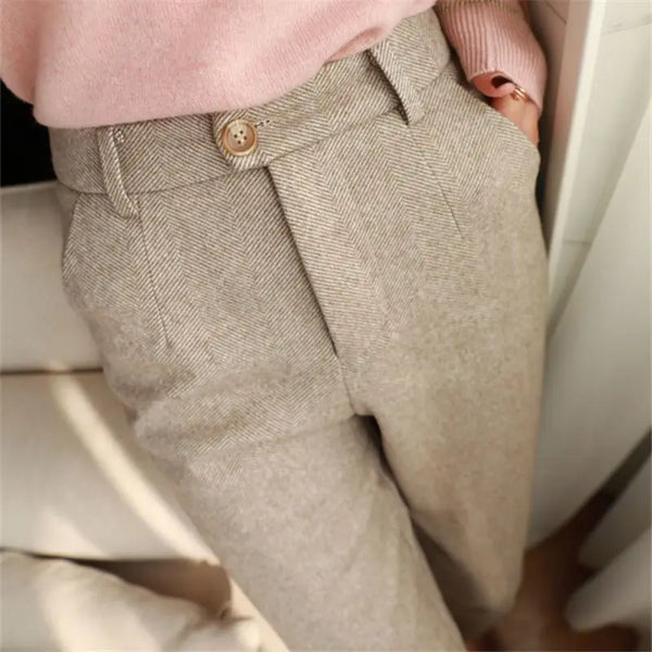 Versatile high-waist suit pants with button fly and working pockets for year-round professional styling
