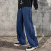 Contemporary black denim jeans with loose fit and straight wide-leg styling