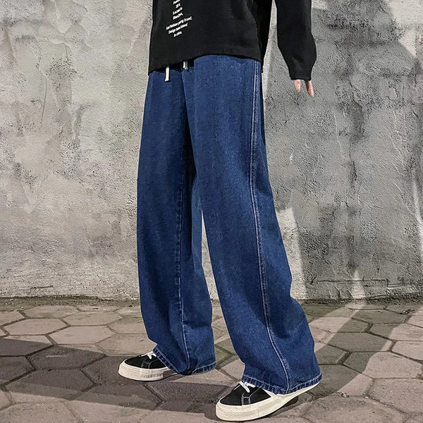 Contemporary black denim jeans with loose fit and straight wide-leg styling