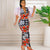 Chic high-waist pencil skirt in black, paired with a billowing lantern-sleeve blouse.