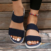 Beige low wedge sandals in breathable elastic knit with streamlined silhouette