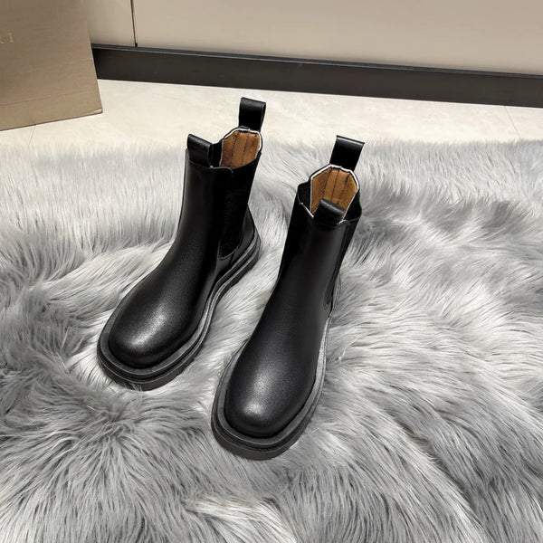 Chic Chelsea boots for women with thick sole, slip-on design, and durable rubber outsole, perfect for autumn and spring wear.