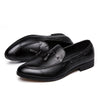 Tassel loafers displayed with accessories, showcasing their versatility for events.