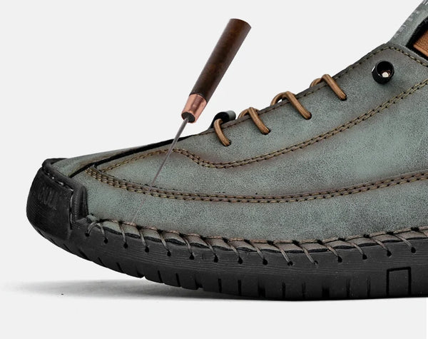 Pair of handcrafted leather slip-ons displayed showing true-to-size fit and modern masculine design