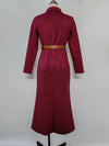 Side view of the belted Autumn Whispers dress, illustrating its graceful movement and design.