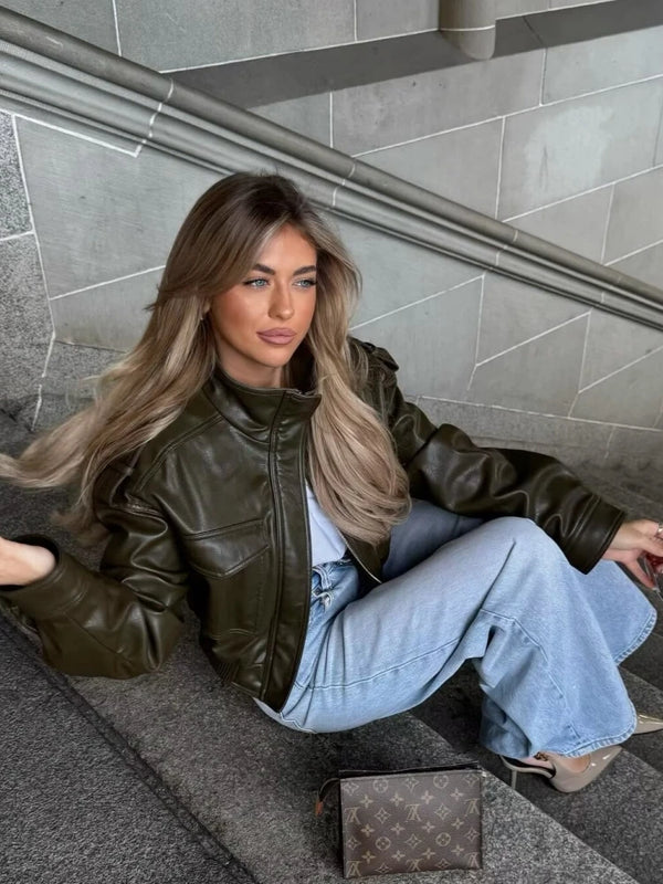 Chic army green faux leather jacket for women with stand collar, loose fit, and functional pockets, perfect for winter style.