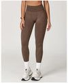 Charcoal gray high waist yoga pants with breathable fabric.