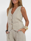 Model wearing the Radiant Summer Suit with a blazer, showcasing versatility.