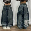 Trendy wide-leg jeans with unique designs for a standout look.