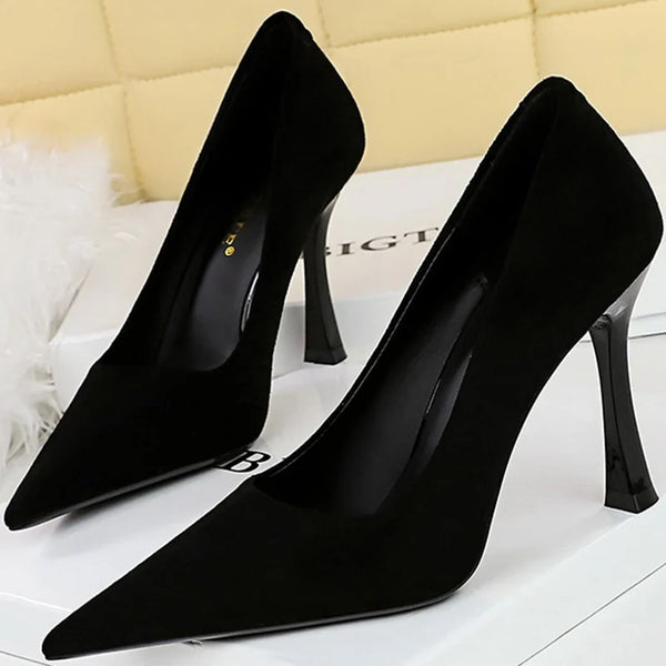 Elegant black stiletto high heels with pointed toe design.