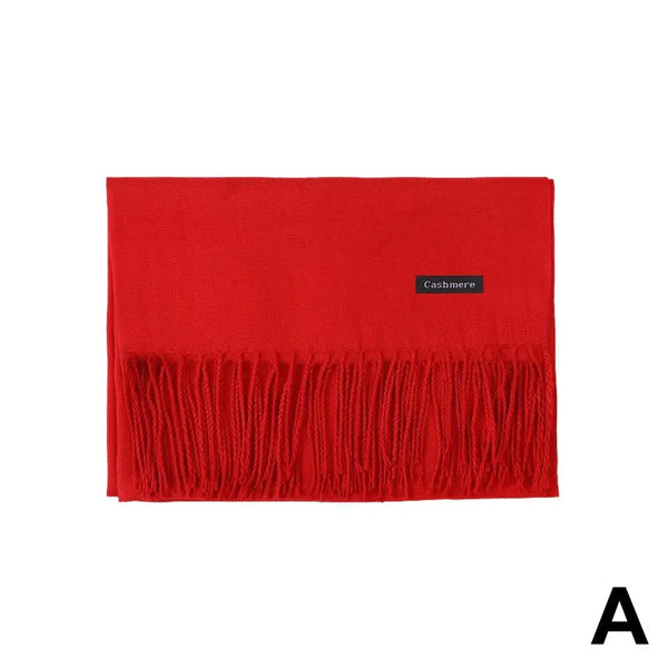 Warm and stylish black scarf, ideal for women's winter fashion.